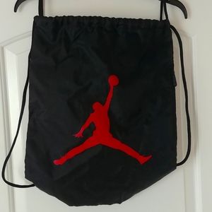 Jordan strap bag in black and red